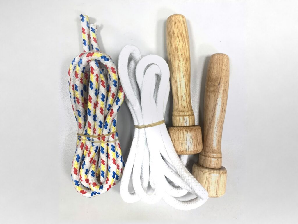 Jump ropes with wooden handles and braided ropes